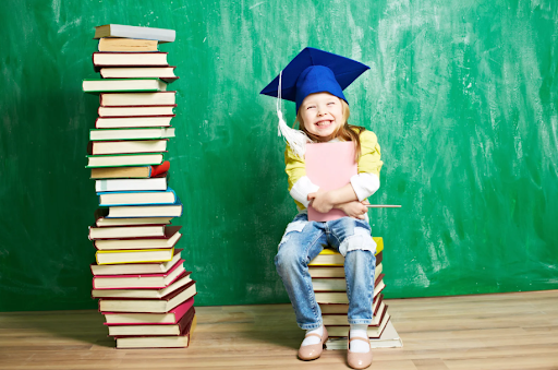Prek student with book